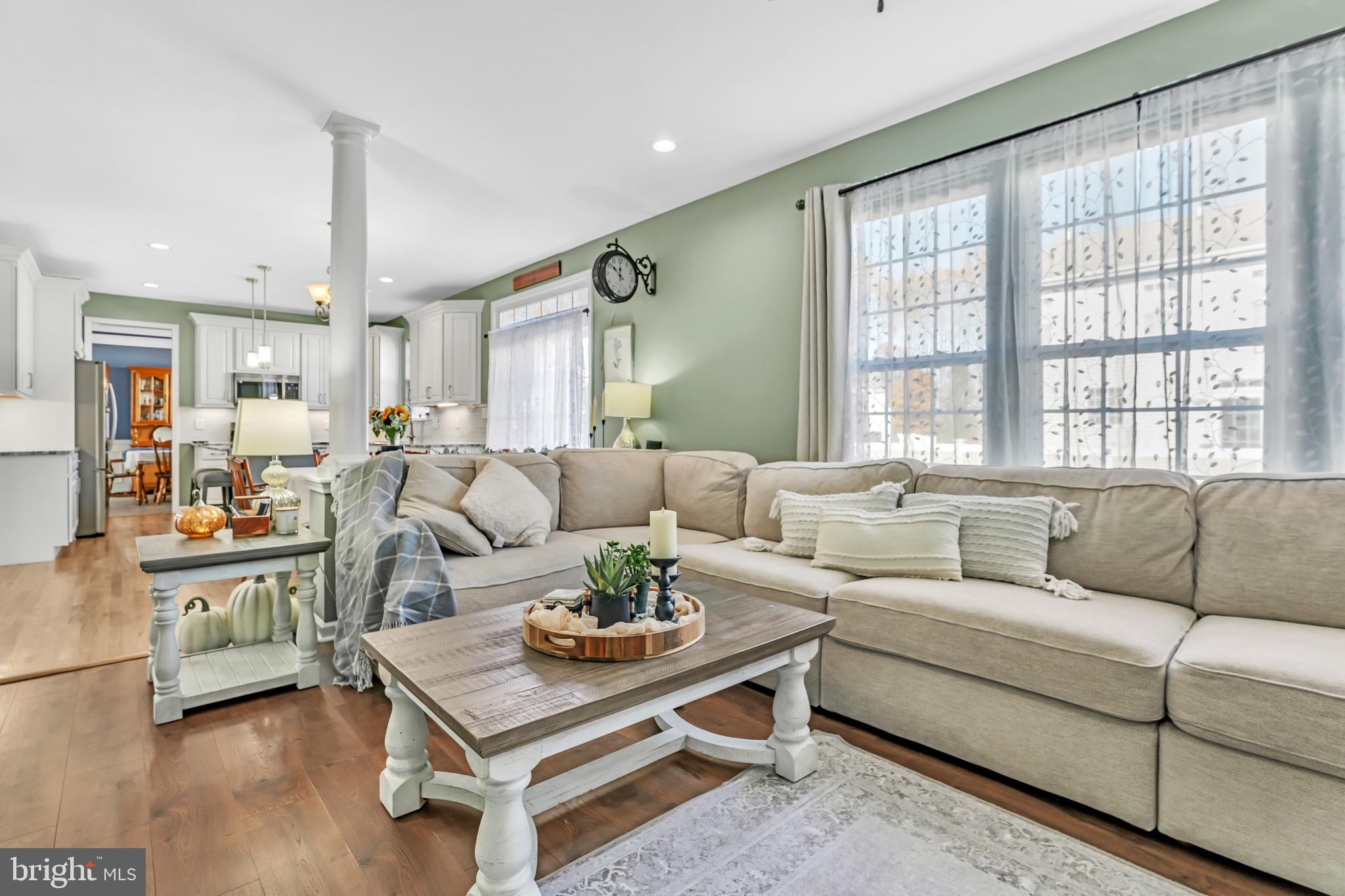 63 Homestead Drive Pemberton, NJ 08068 - Photo 9 of 46 a living room with furniture and a large window