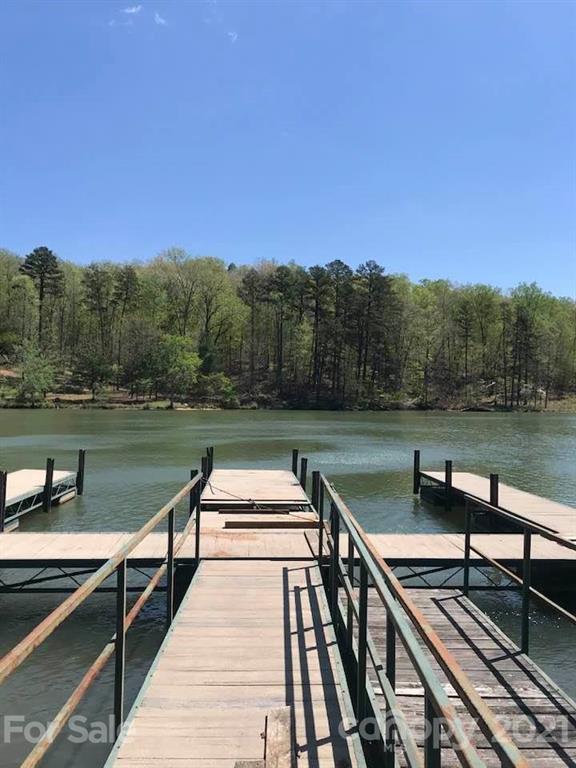 0 Pointe Ln Mill Spring, Unit 8 Mill Spring, NC 28756 - Photo 1 of 19 a view of river and trees in the background