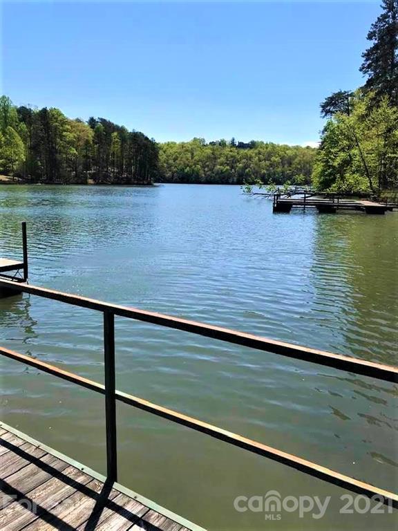 0 Pointe Ln Mill Spring, Unit 8 Mill Spring, NC 28756 - Photo 8 of 19 a view of a lake from a balcony