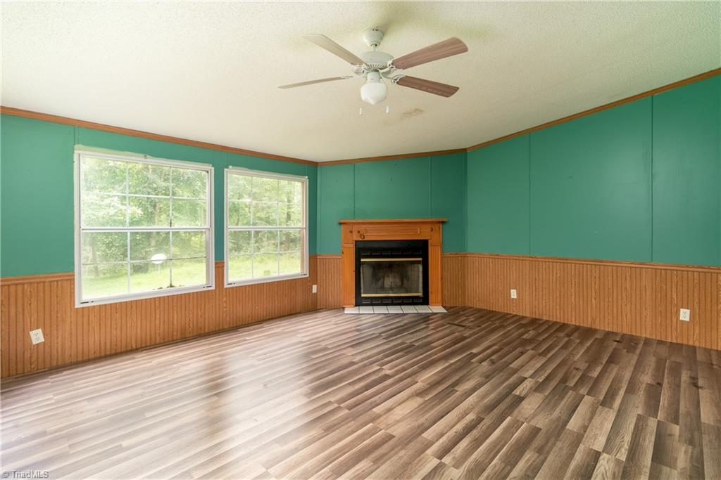 3940 Friendship Patterson Mill Road Burlington, NC 27215 - Photo 21 of 38 Great room with fireplace