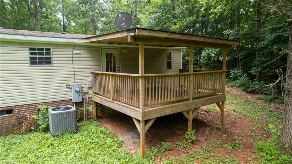 3940 Friendship Patterson Mill Road Burlington, NC 27215 - Photo 33 of 38 Covered Deck!