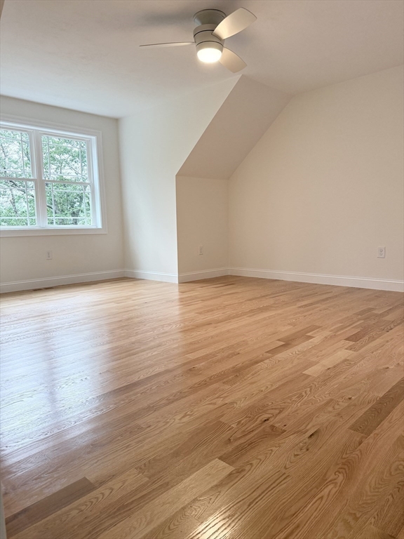 26 Marlyn Road Billerica, MA 01821 - Photo 17 of 36 a view of an empty room with wooden floor and a window