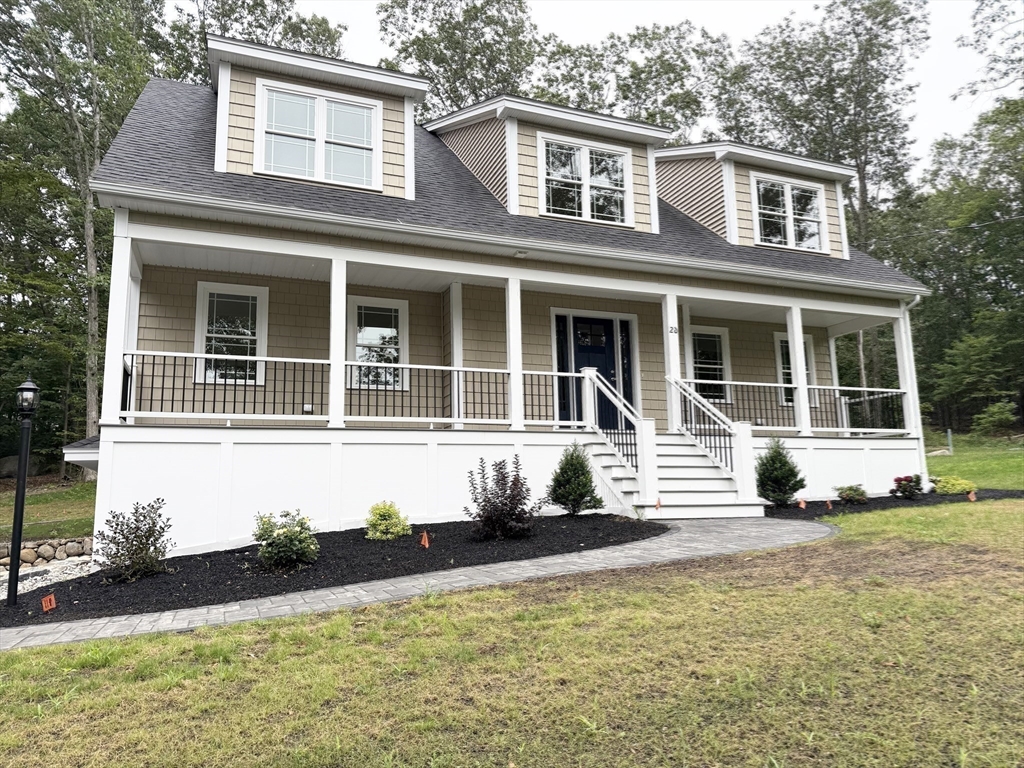 26 Marlyn Road Billerica, MA 01821 - Photo 25 of 36 a front view of a house with garden
