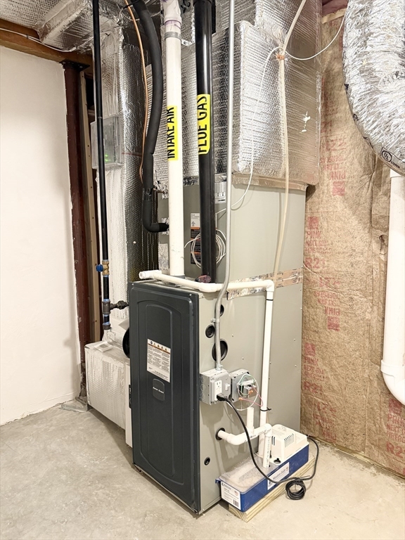 26 Marlyn Road Billerica, MA 01821 - Photo 31 of 36 a bathroom with a sink and mirror