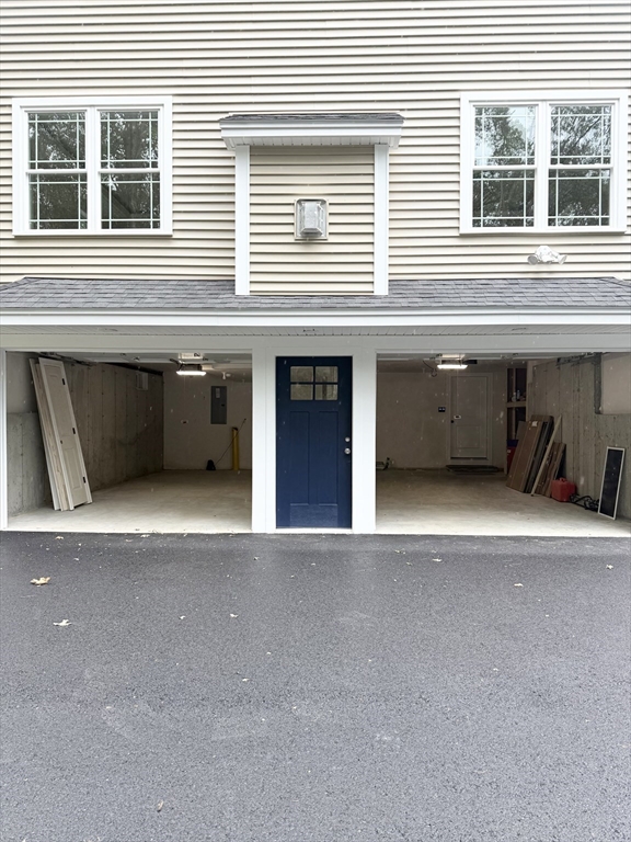26 Marlyn Road Billerica, MA 01821 - Photo 34 of 36 a view of a house with a parking space