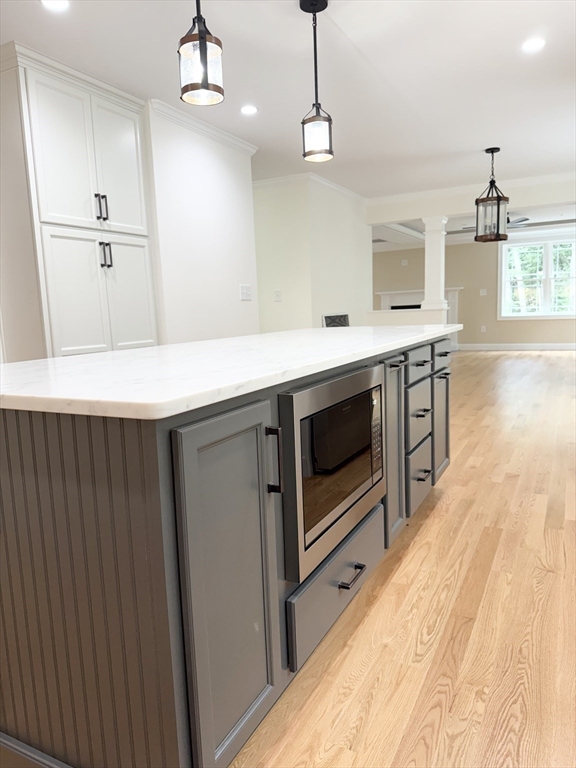 26 Marlyn Road Billerica, MA 01821 - Photo 5 of 36 a kitchen with stainless steel appliances a stove a sink and a refrigerator