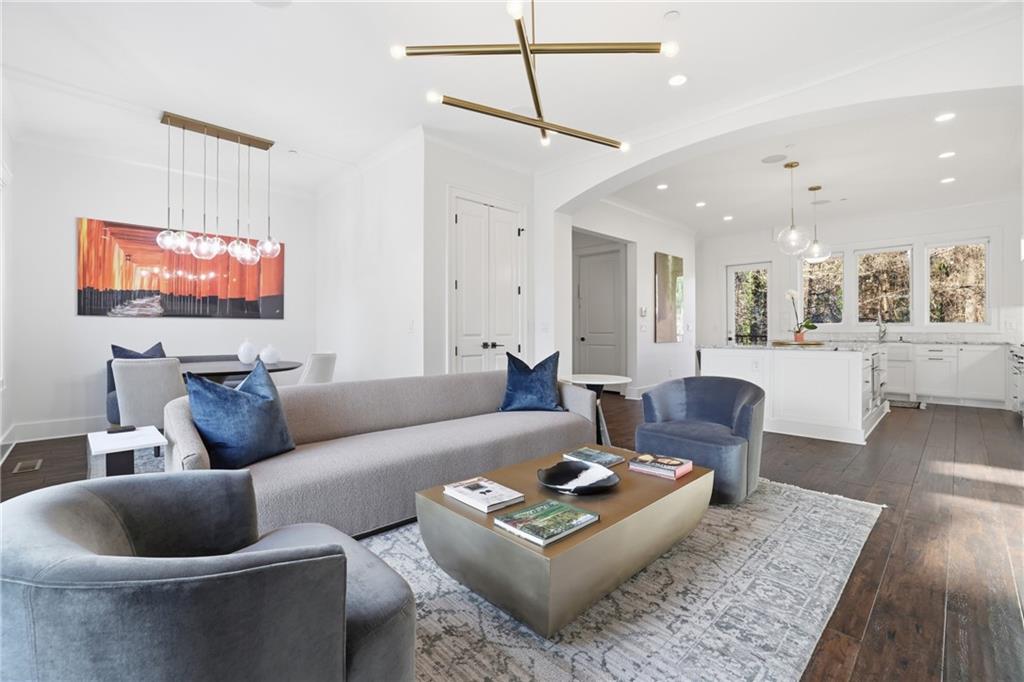 773 Lenox Lane Atlanta, GA 30324 - Photo 17 of 54 a living room with furniture a rug and a flat screen tv
