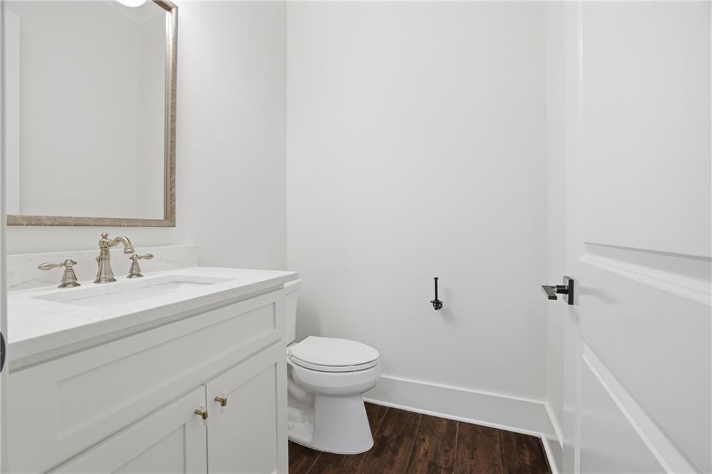 773 Lenox Lane Atlanta, GA 30324 - Photo 21 of 54 a bathroom with a sink and a toilet