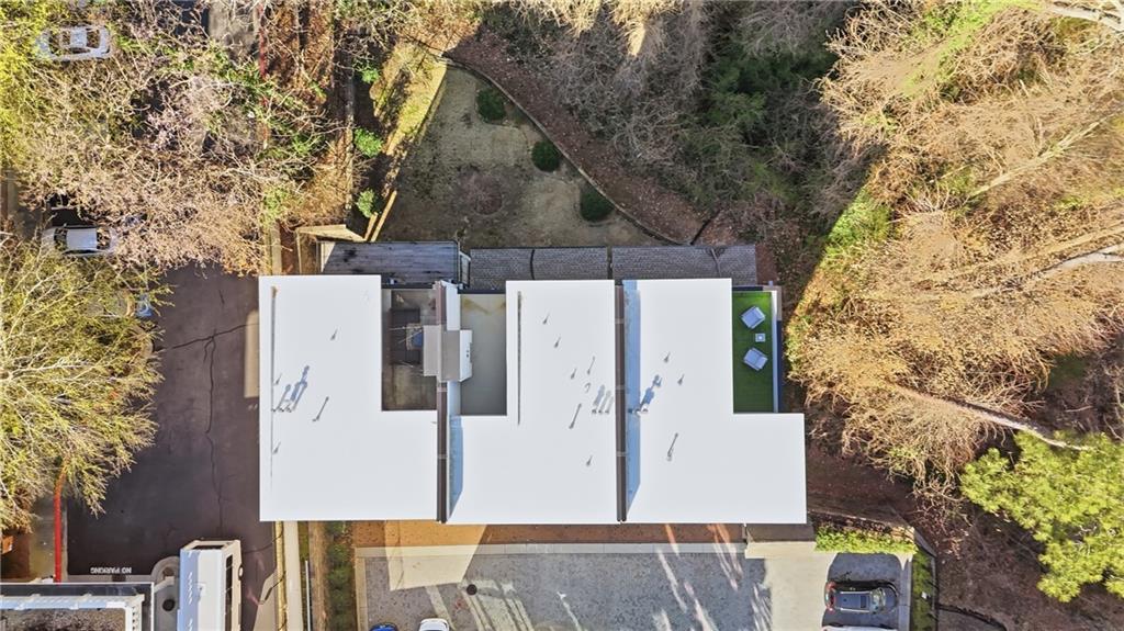 773 Lenox Lane Atlanta, GA 30324 - Photo 46 of 54 a aerial view of a house with large trees