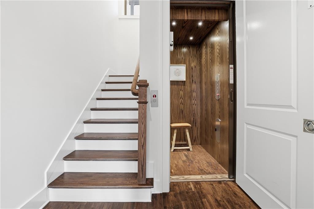 773 Lenox Lane Atlanta, GA 30324 - Photo 6 of 54 a view of a hallway with wooden floor and entryway