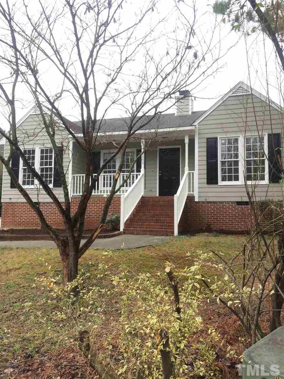 2305 Havering Place Raleigh, NC 27604 - Photo 3 of 10 a view of a house with a yard