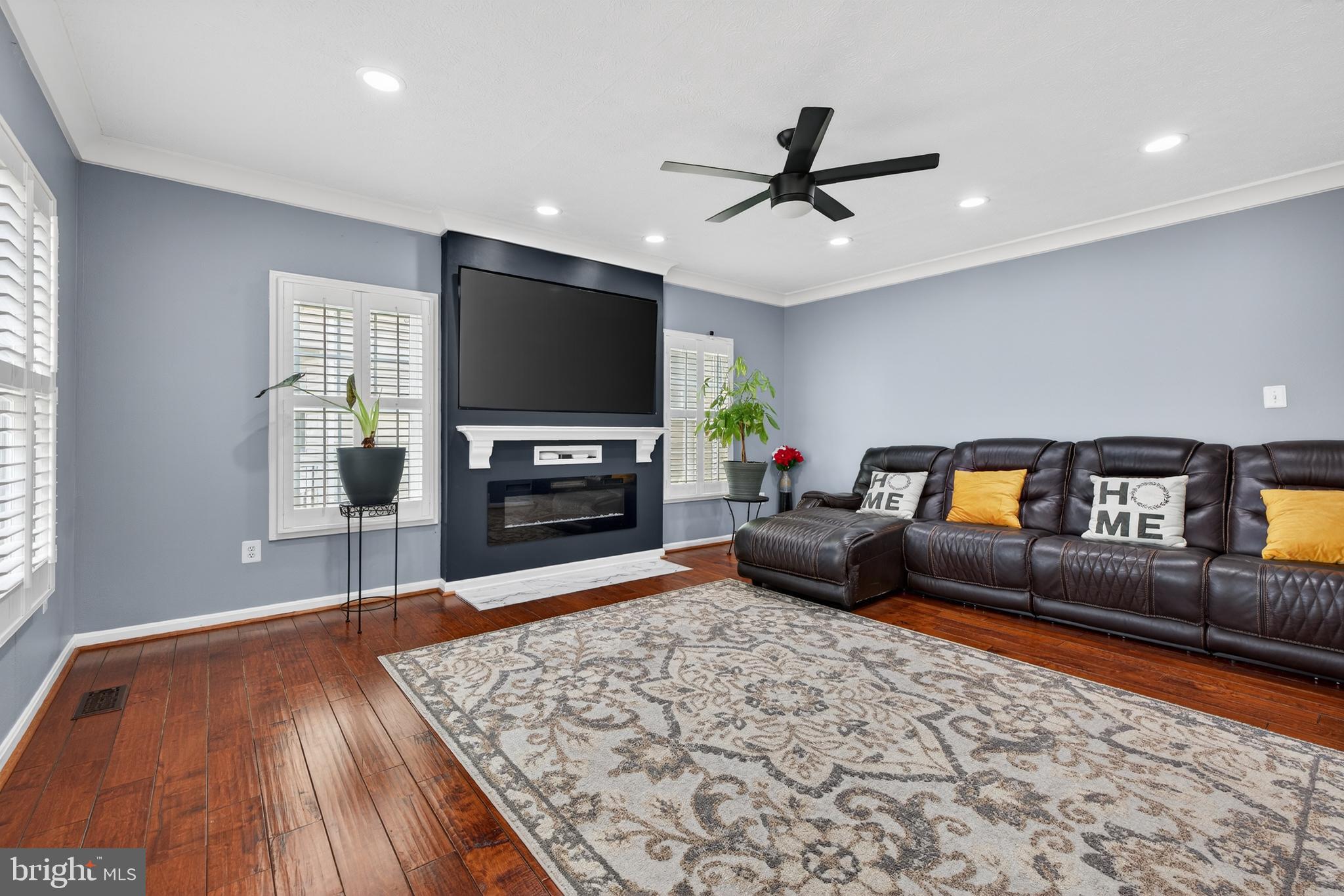611 Hunting Ridge Drive Frederick, MD 21703 - Photo 18 of 50 a living room with furniture and a flat screen tv