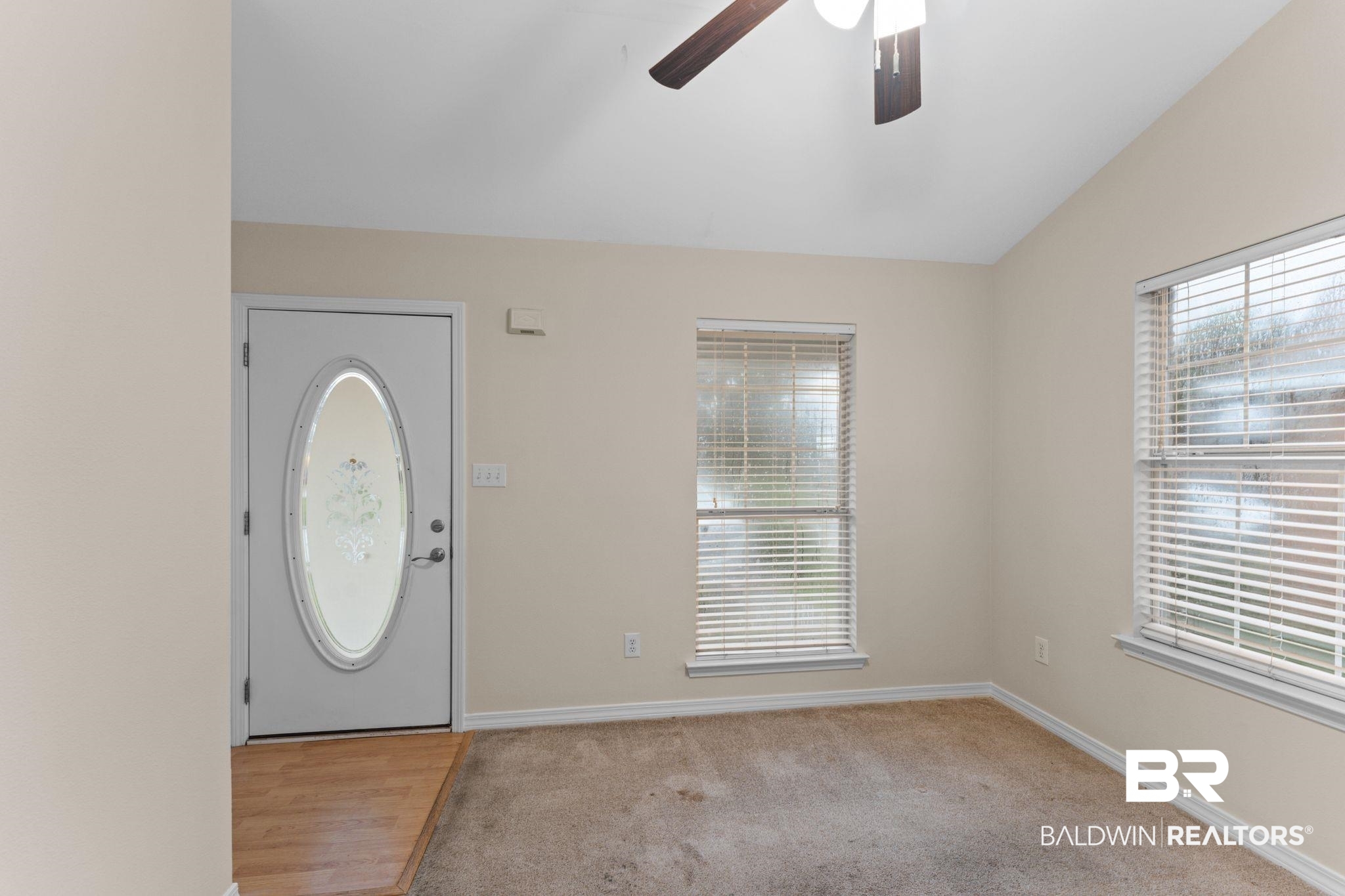 4009 Kendallbrook Loop Foley, AL 36535 - Photo 5 of 28 Foyer featuring a ceiling fan, vaulted ceiling, and light carpet