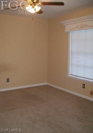 18513 Sunflower Road Fort Myers, FL 33967 - Photo 10 of 14 a view of an empty room with a window