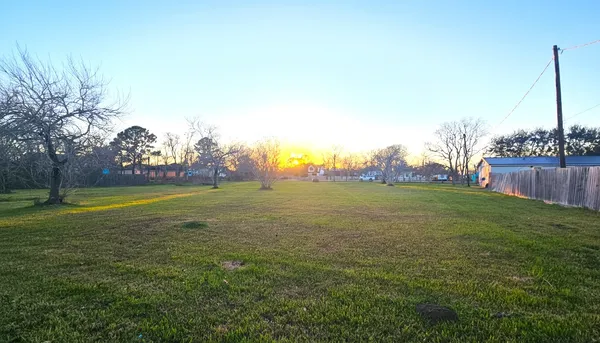 a view of a golf course with a garden