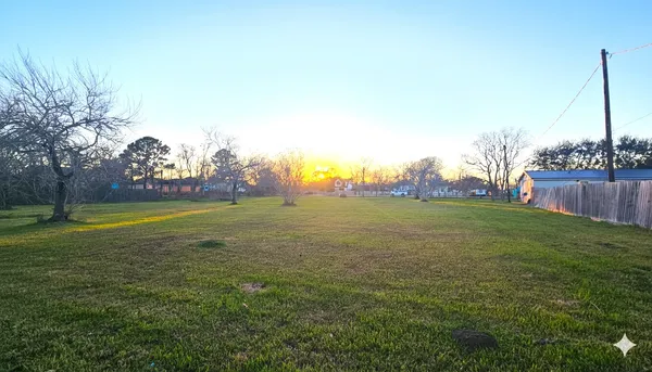 a view of a golf course with a garden