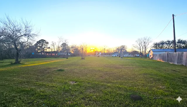 a view of a golf course with a garden