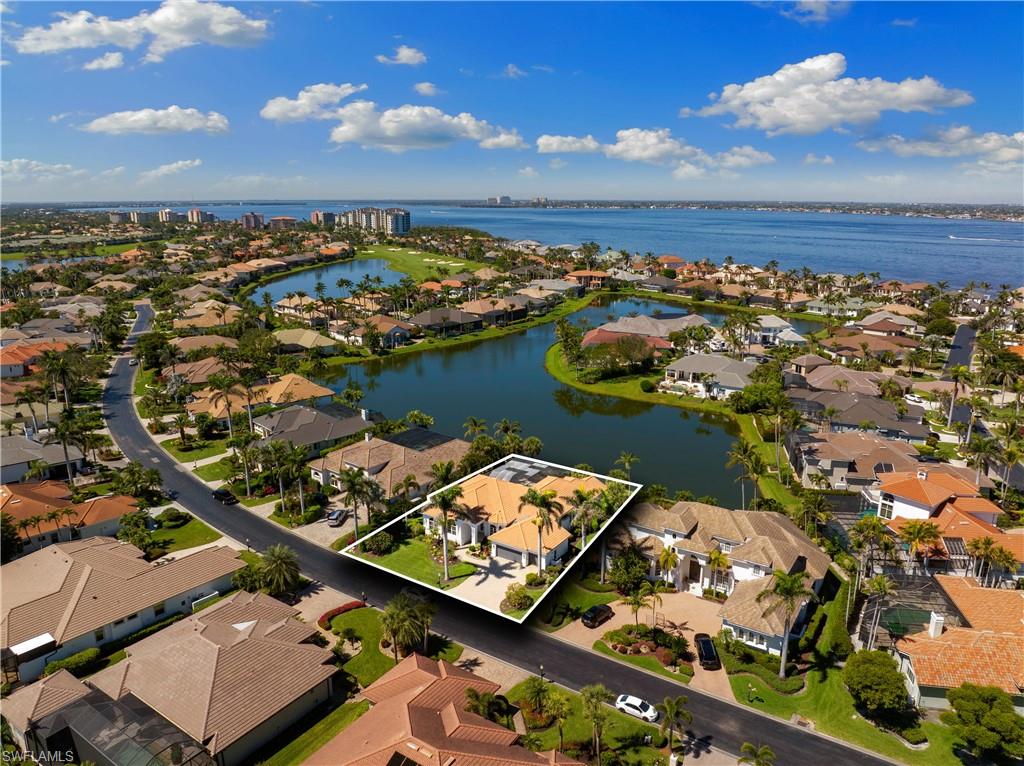 11290 Compass Point Drive Fort Myers, FL 33908 - Photo 3 of 50 an aerial view of a city