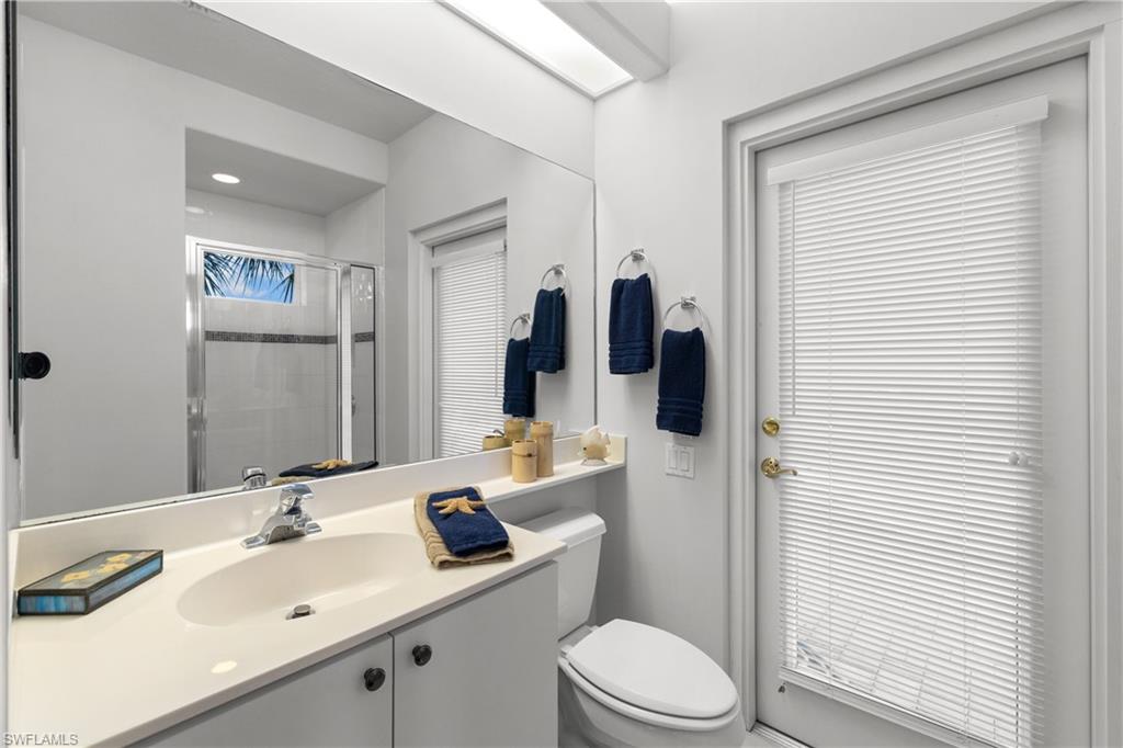 11290 Compass Point Drive Fort Myers, FL 33908 - Photo 31 of 50 a bathroom with a sink toilet and shower