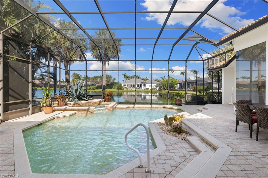 11290 Compass Point Drive Fort Myers, FL 33908 - Photo 4 of 50 a view of a swimming pool with outdoor seating