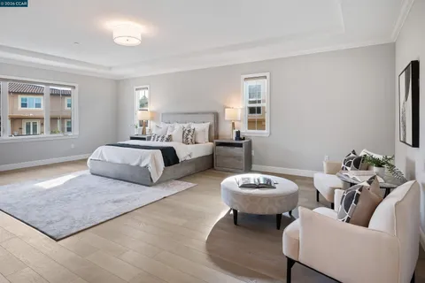 a bathroom with a sink vanity tub and a mirror