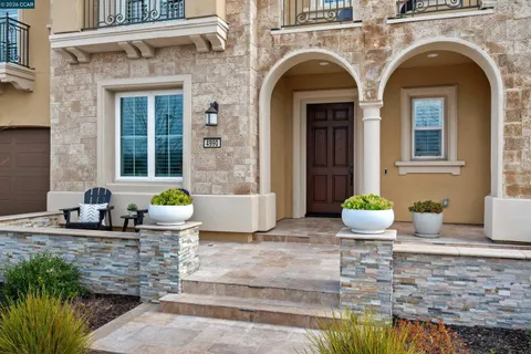 a view of a livingroom with wooden floor