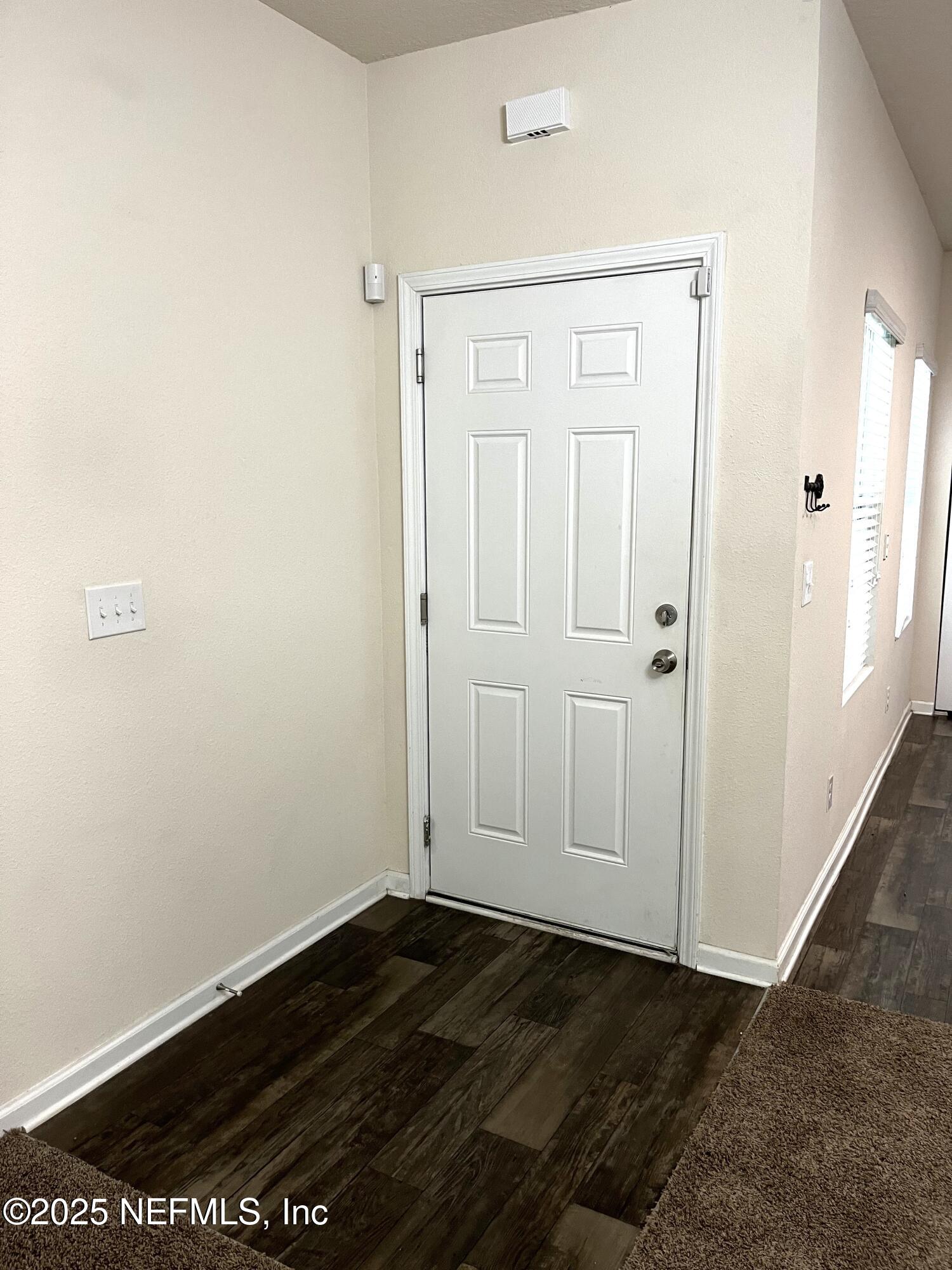 850 Servia Drive Jacksonville, FL 32259 - Photo 11 of 16 an empty room with wooden floor