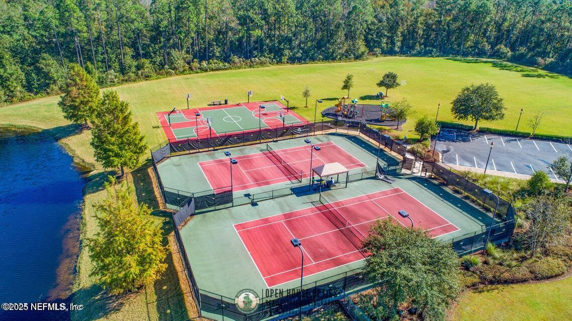 850 Servia Drive Jacksonville, FL 32259 - Photo 13 of 16 an aerial view of a pool patio swimming pool and outdoor seating