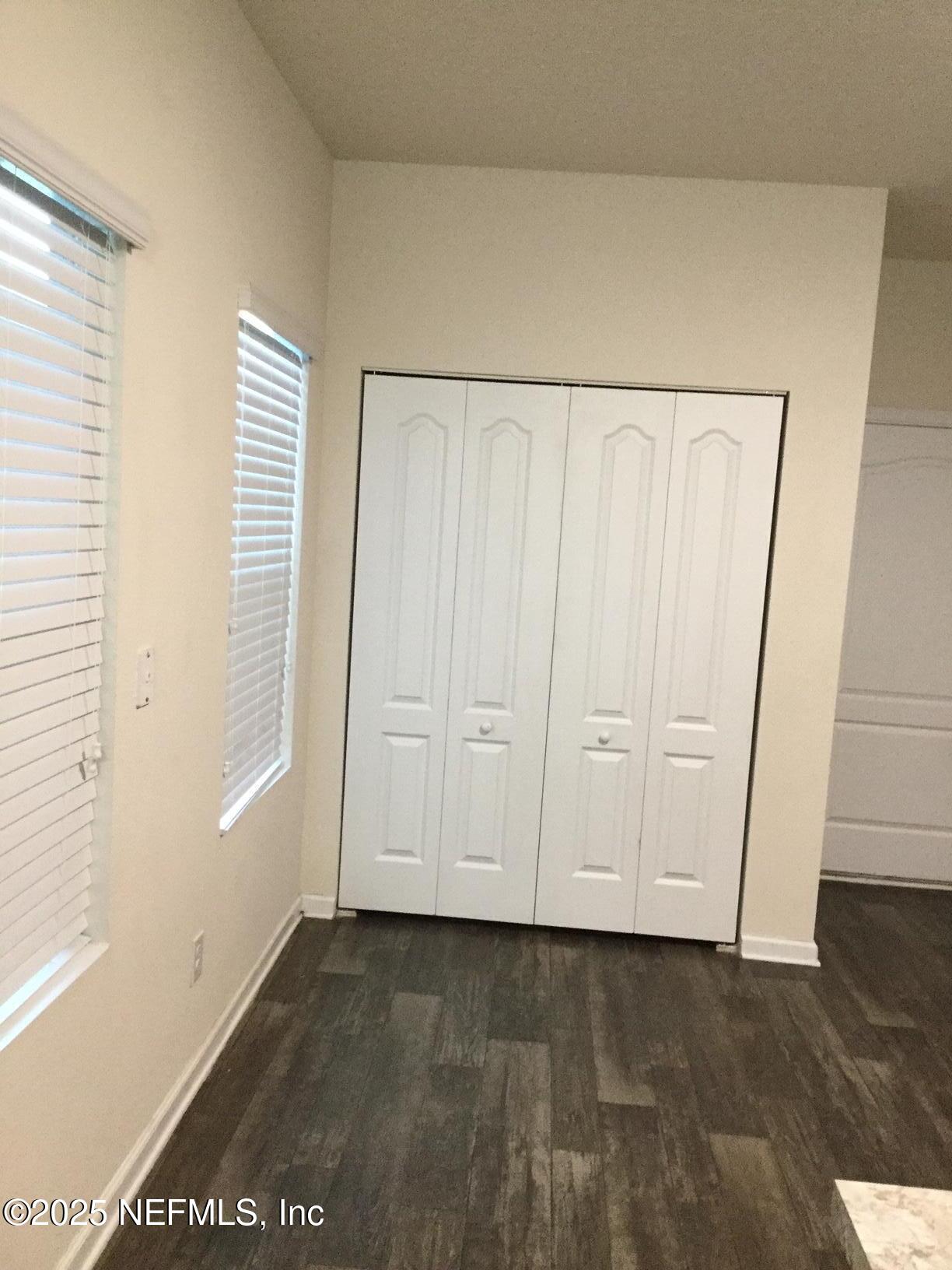 850 Servia Drive Jacksonville, FL 32259 - Photo 4 of 16 a view of a closet area with hardwood floor
