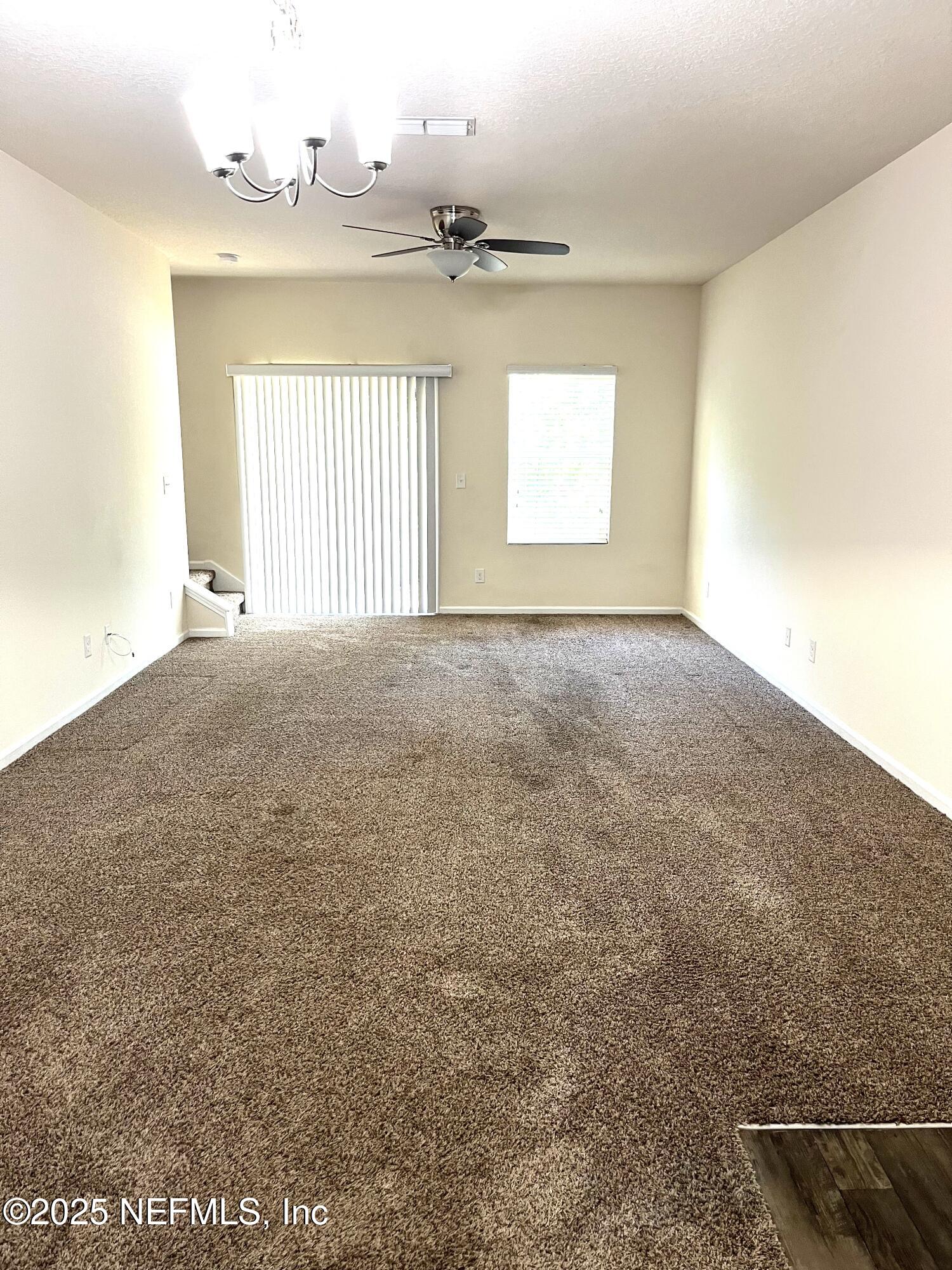 850 Servia Drive Jacksonville, FL 32259 - Photo 6 of 16 a view of an empty room with a window