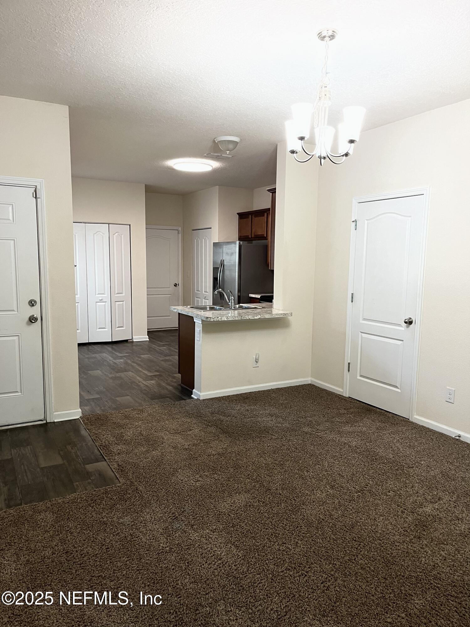 850 Servia Drive Jacksonville, FL 32259 - Photo 7 of 16 a view of a kitchen with a sink and cabinet area