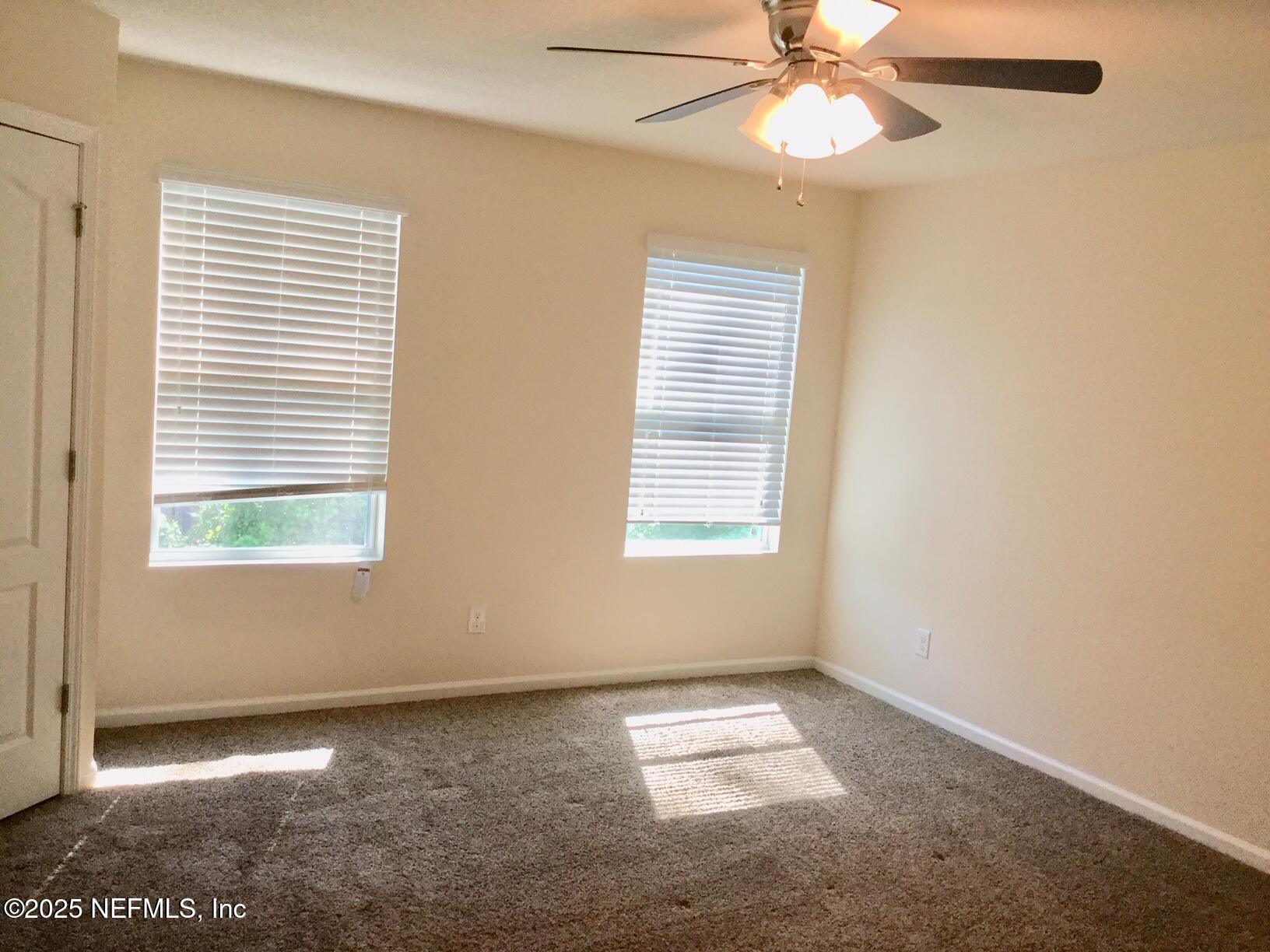 850 Servia Drive Jacksonville, FL 32259 - Photo 9 of 16 a view of an empty room with a window