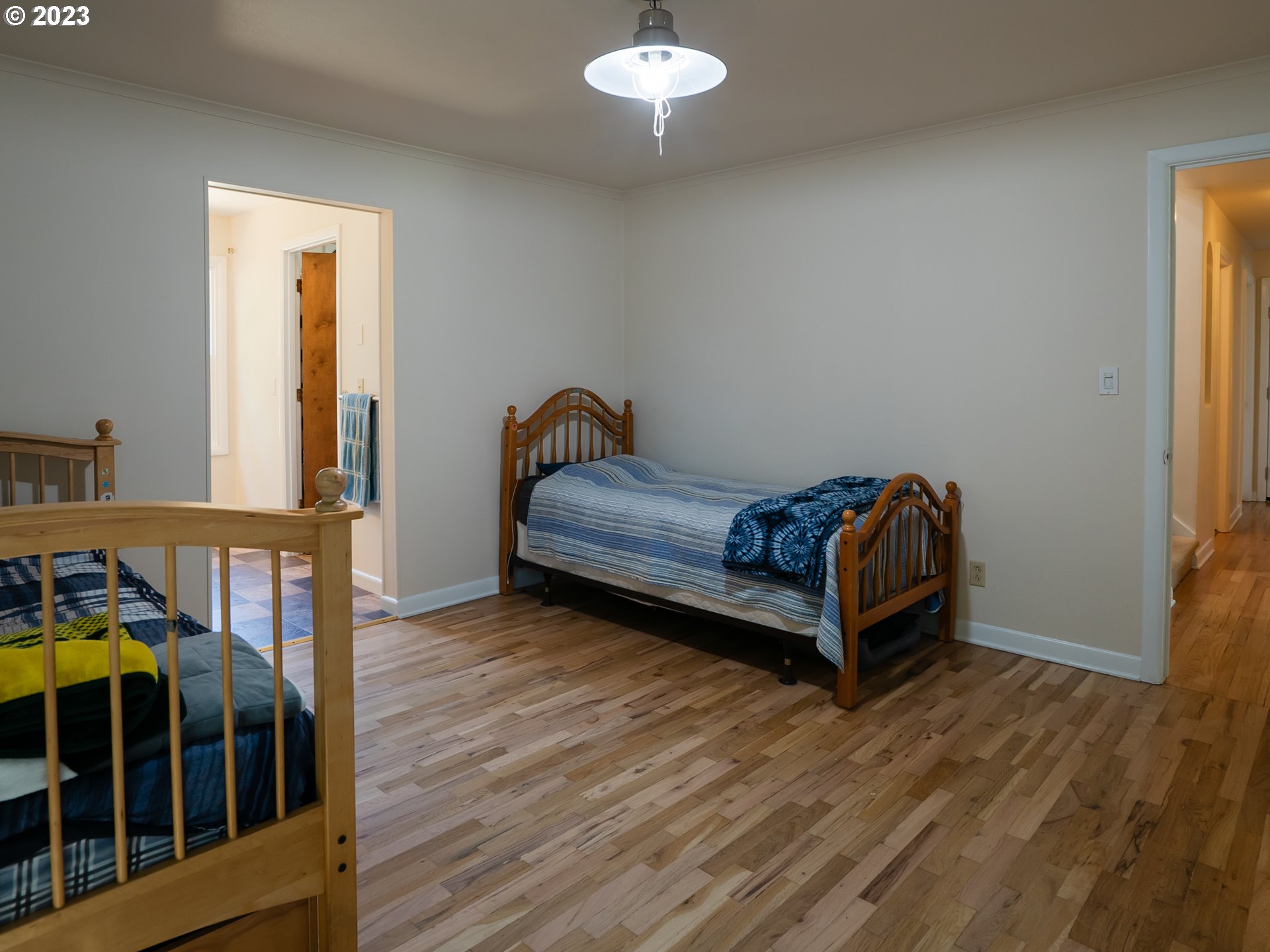 488 Sunshine Acres Drive Eugene, OR 97401 - Photo 23 of 40 a bedroom with furniture and a window