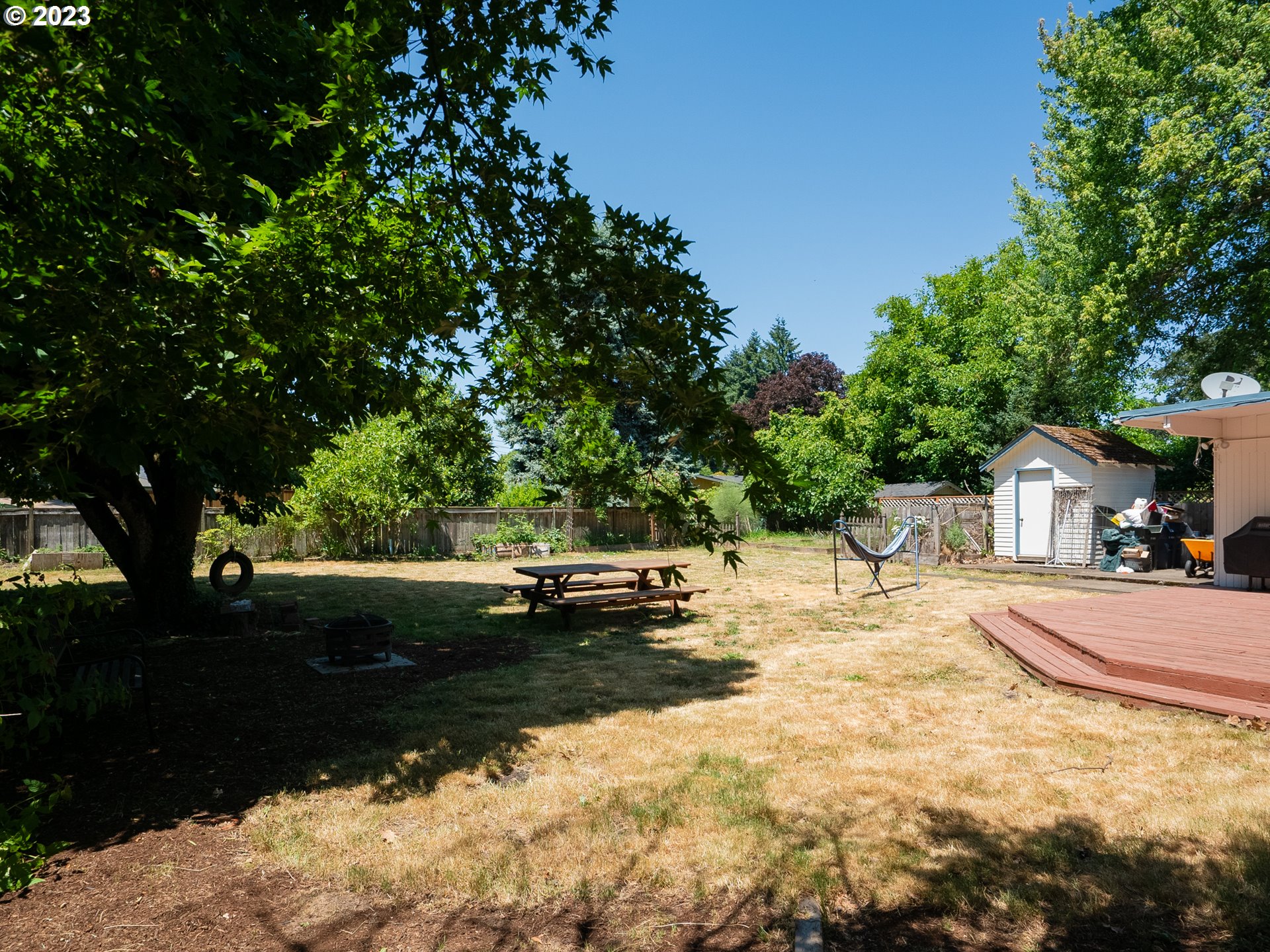 488 Sunshine Acres Drive Eugene, OR 97401 - Photo 38 of 40 a view of a lounge chair and fire pit