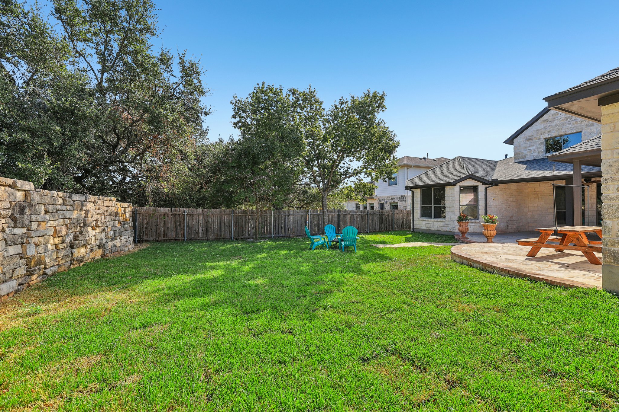 7324 Moon Rock Road Austin, TX 78739 - Photo 29 of 30 a front view of a house with backyard and garden