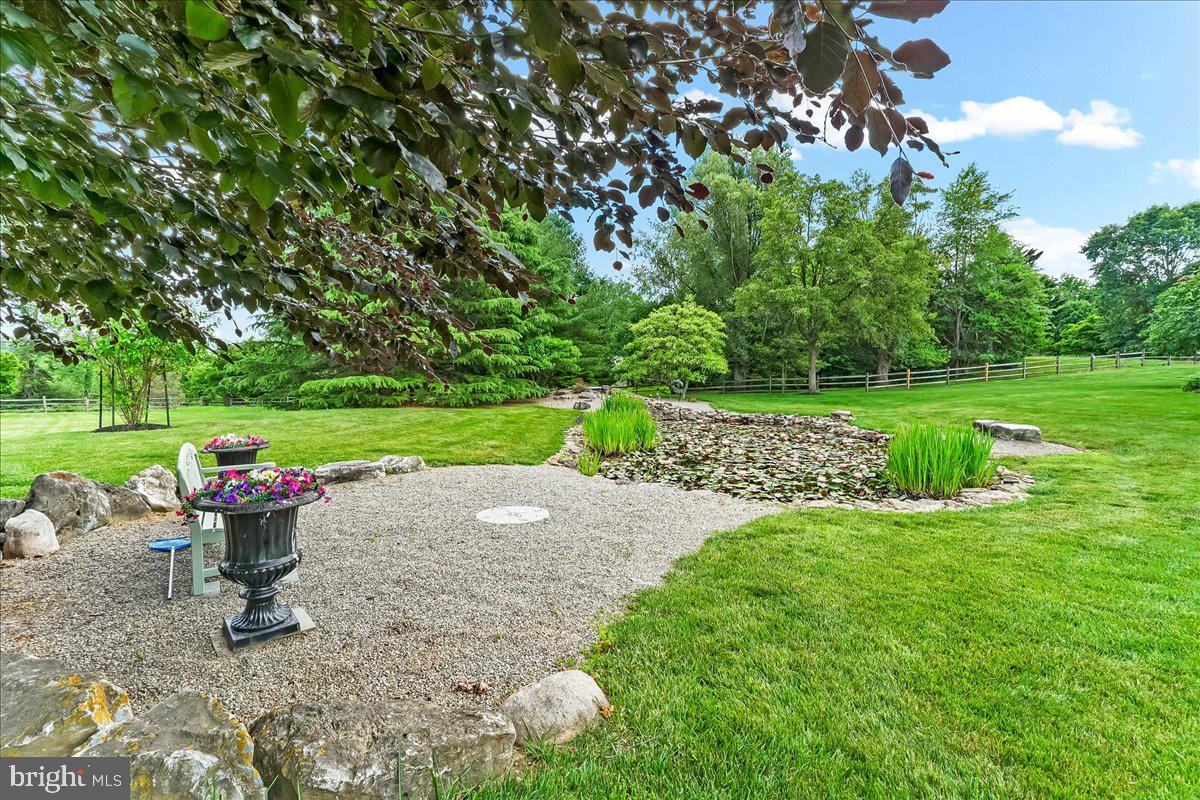 7 Bolingbroke Road West Chester, PA 19382 - Photo 73 of 86 Serene garden oasis with tranquil pond.