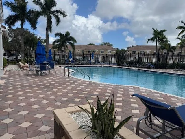 a view of a lake with sitting area