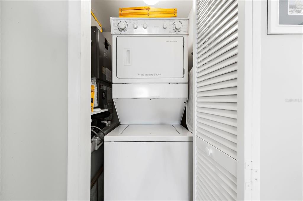 1551 Beach Road, Unit 207 Englewood, FL 34223 - Photo 21 of 40 a utility room with dryer and washer