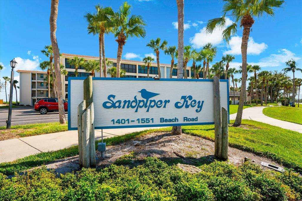 1551 Beach Road, Unit 207 Englewood, FL 34223 - Photo 29 of 40 a view of street with sign board