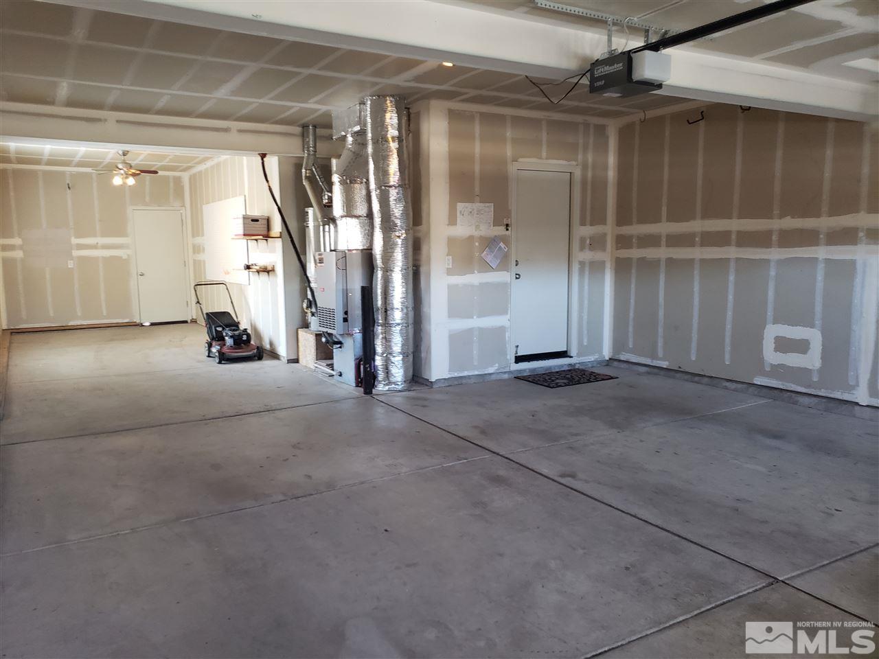 10041 Silver Star Drive Reno, NV 89521 - Photo 23 of 30 a view of an empty room with a window