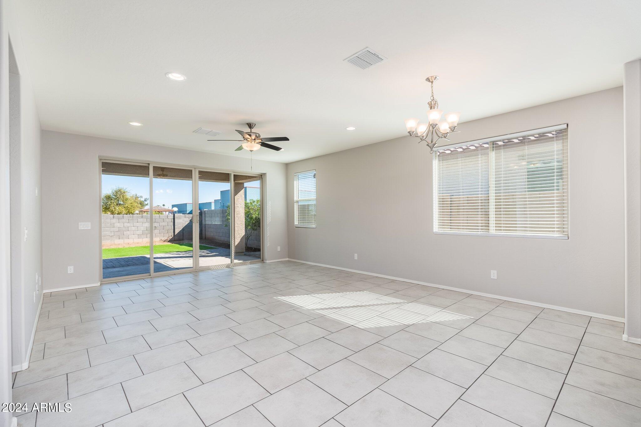 2764 West Apollo Road Phoenix, AZ 85041 - Photo 14 of 45 a view of an empty room with a window