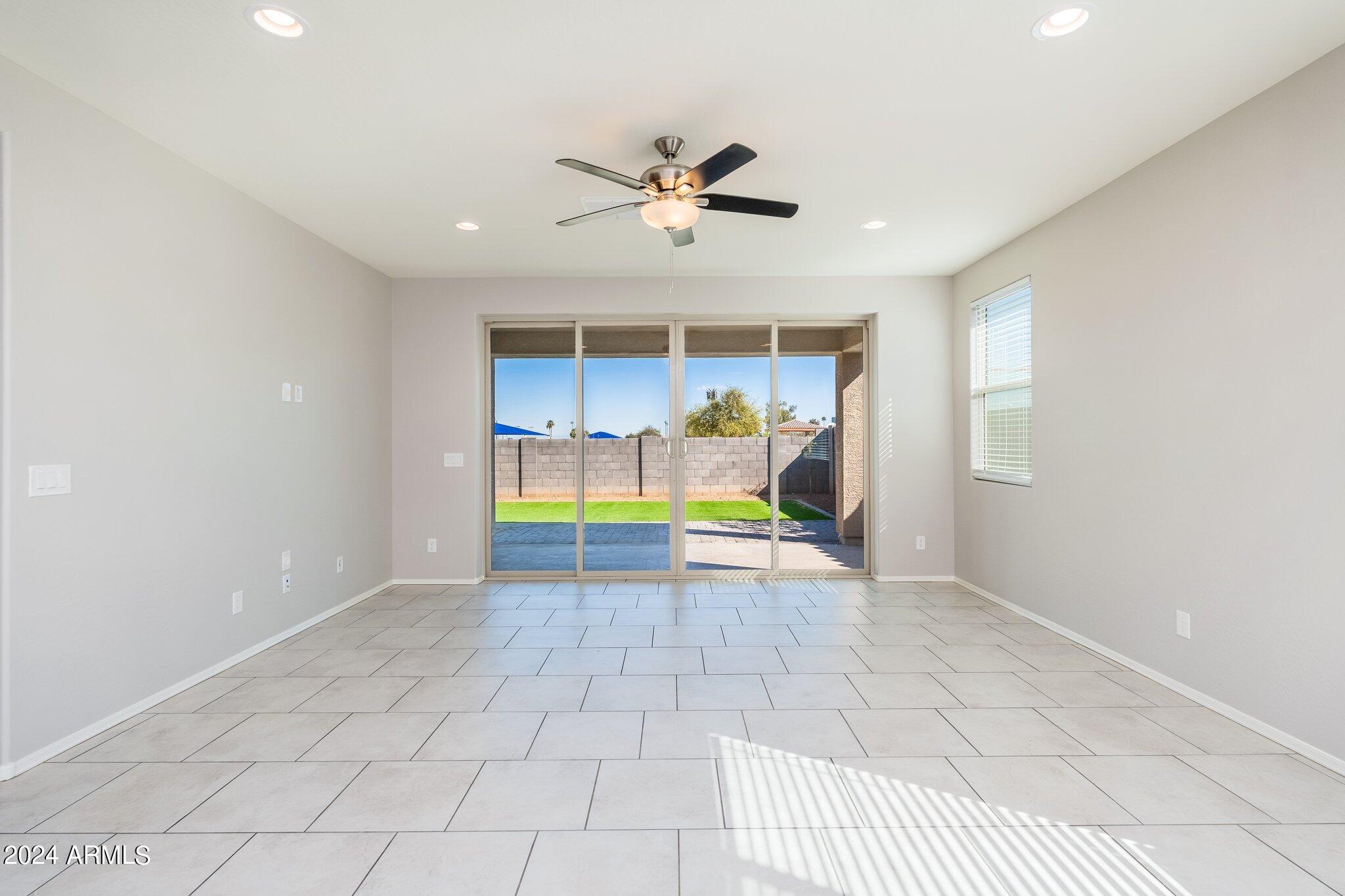 2764 West Apollo Road Phoenix, AZ 85041 - Photo 15 of 45 a view of an empty room with a window