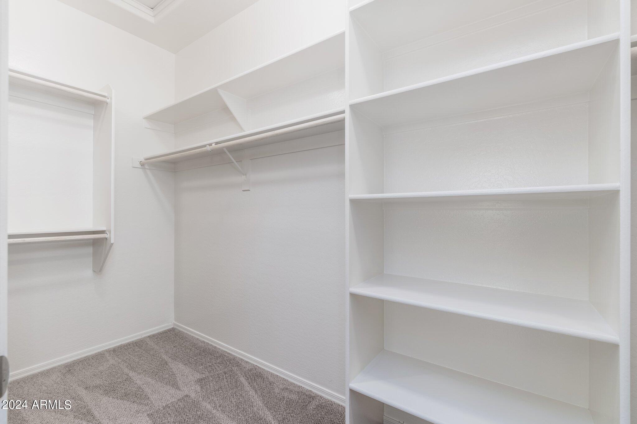 2764 West Apollo Road Phoenix, AZ 85041 - Photo 22 of 45 a view of an empty walk in closet