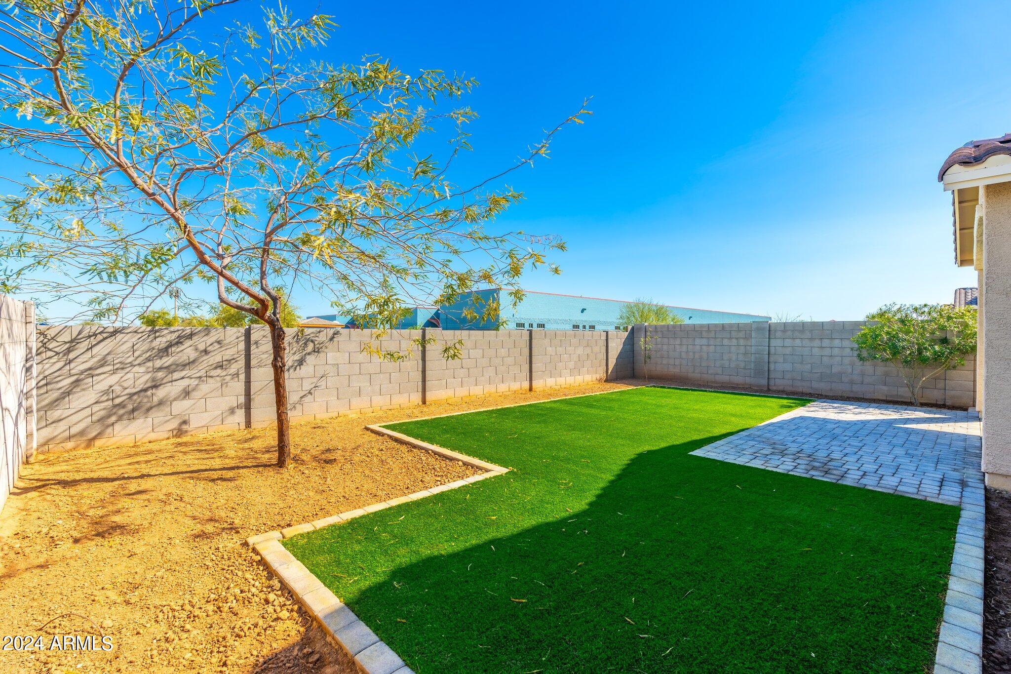 2764 West Apollo Road Phoenix, AZ 85041 - Photo 38 of 45 a view of yard with swimming pool