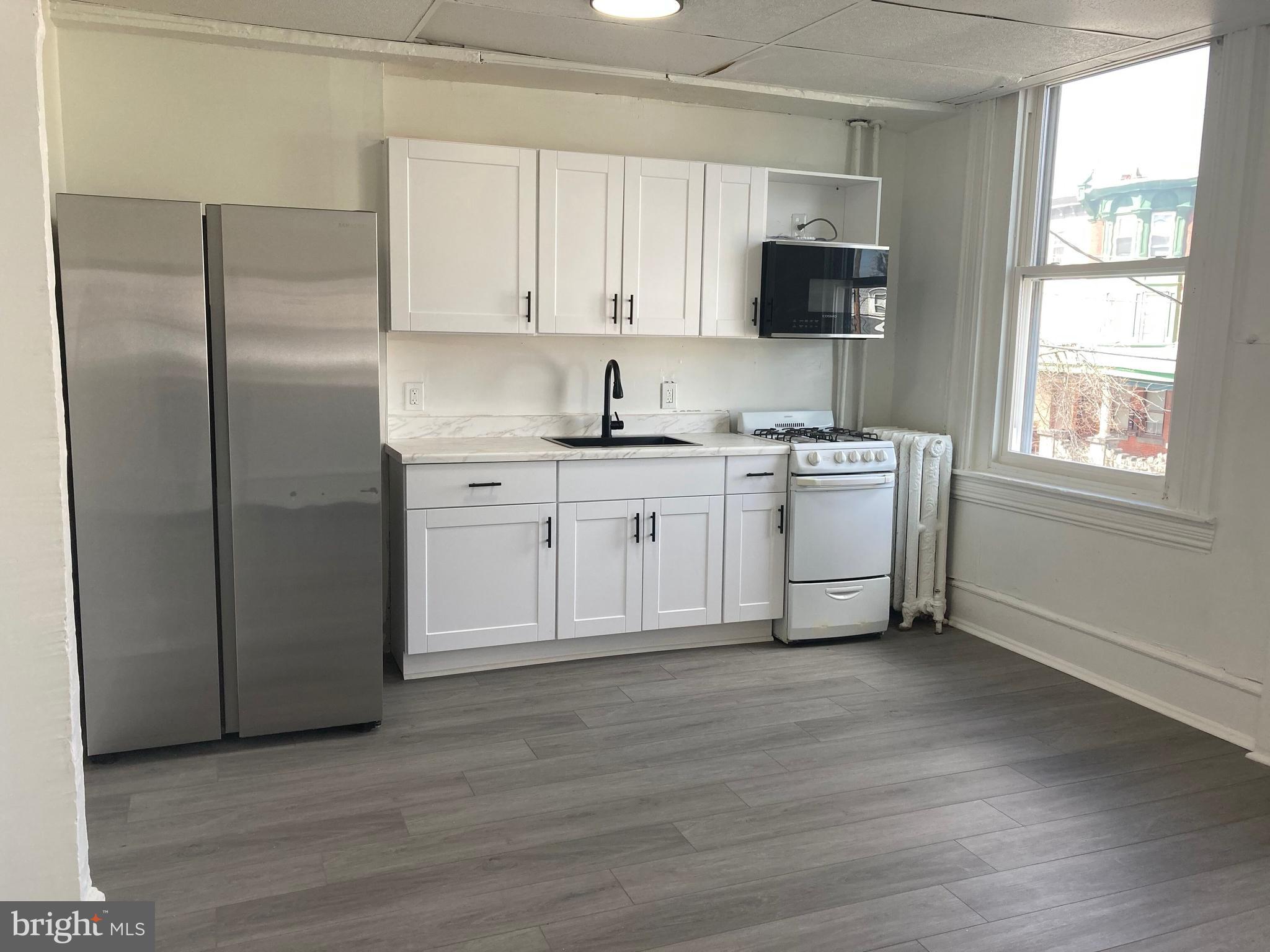 1682 Harrison Street, Unit 3 Philadelphia, PA 19124 - Photo 1 of 10