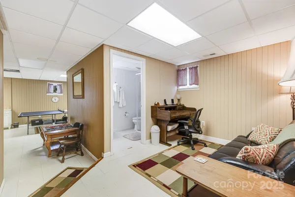 a workspace with furniture and a rug