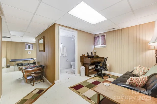 a workspace with furniture and a rug