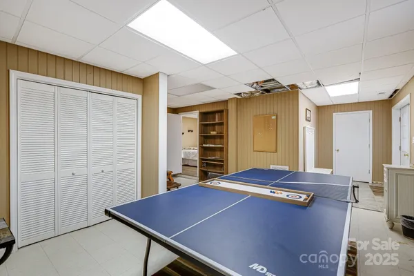 a room with a bed and a table