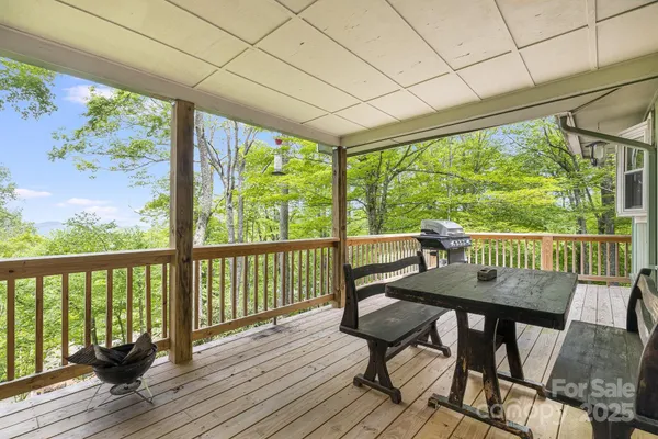 a view of a two chairs in the deck