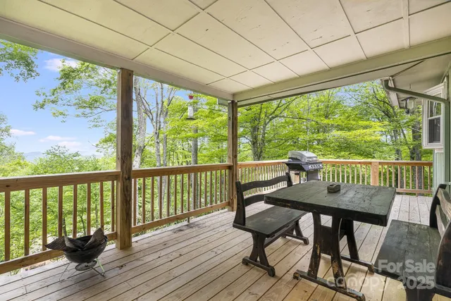 a view of a two chairs in the deck